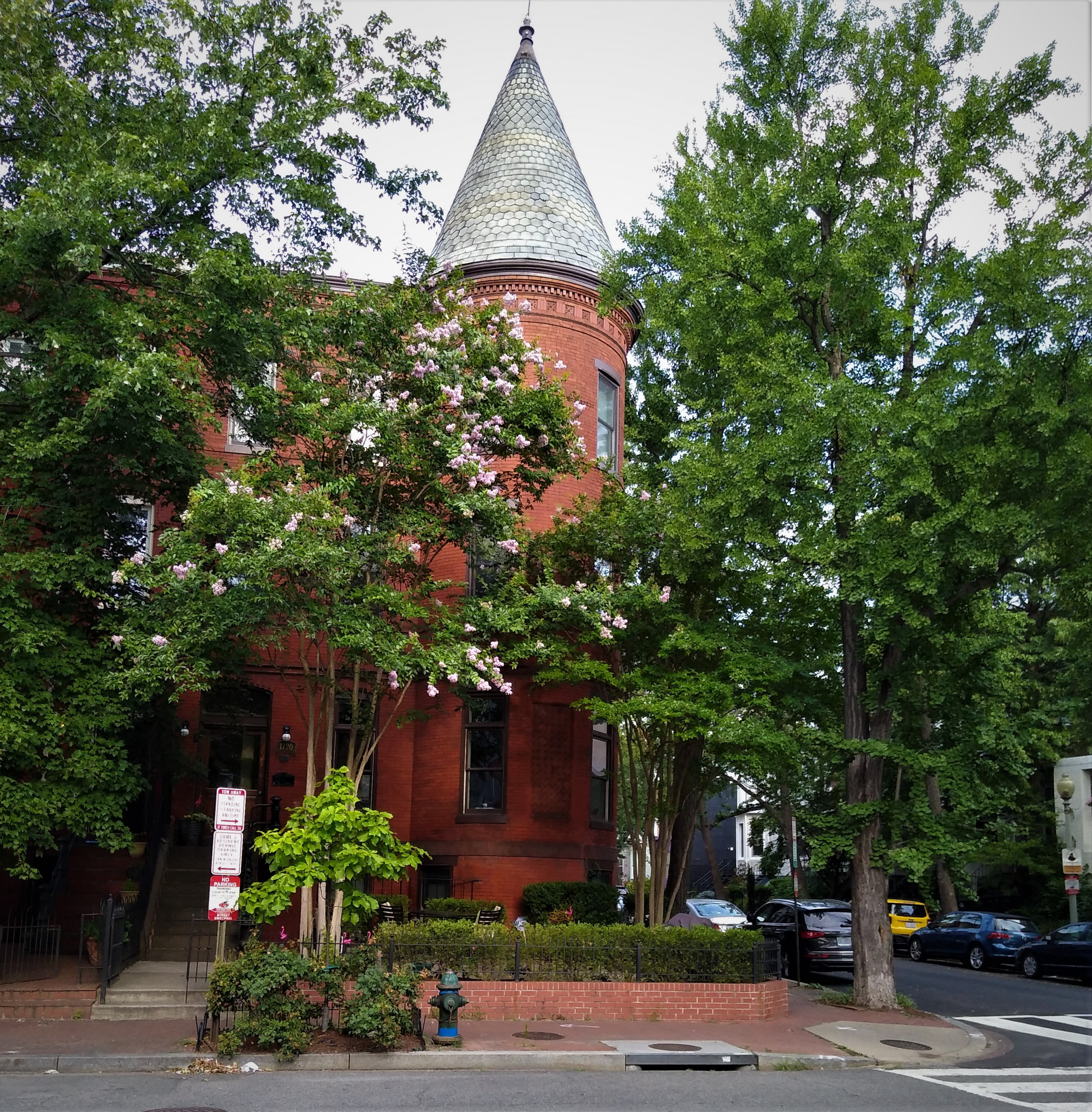 Brick home with a round tower on a corner in Washington, DC