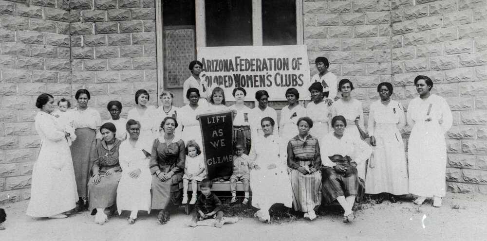 Photograph of women in front of a banner that reads "Arizona Federation of Colored Women's Clubs.