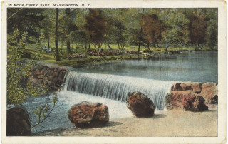 A vibrantly colored vintage postcard of the waterfall near Peirce Mill