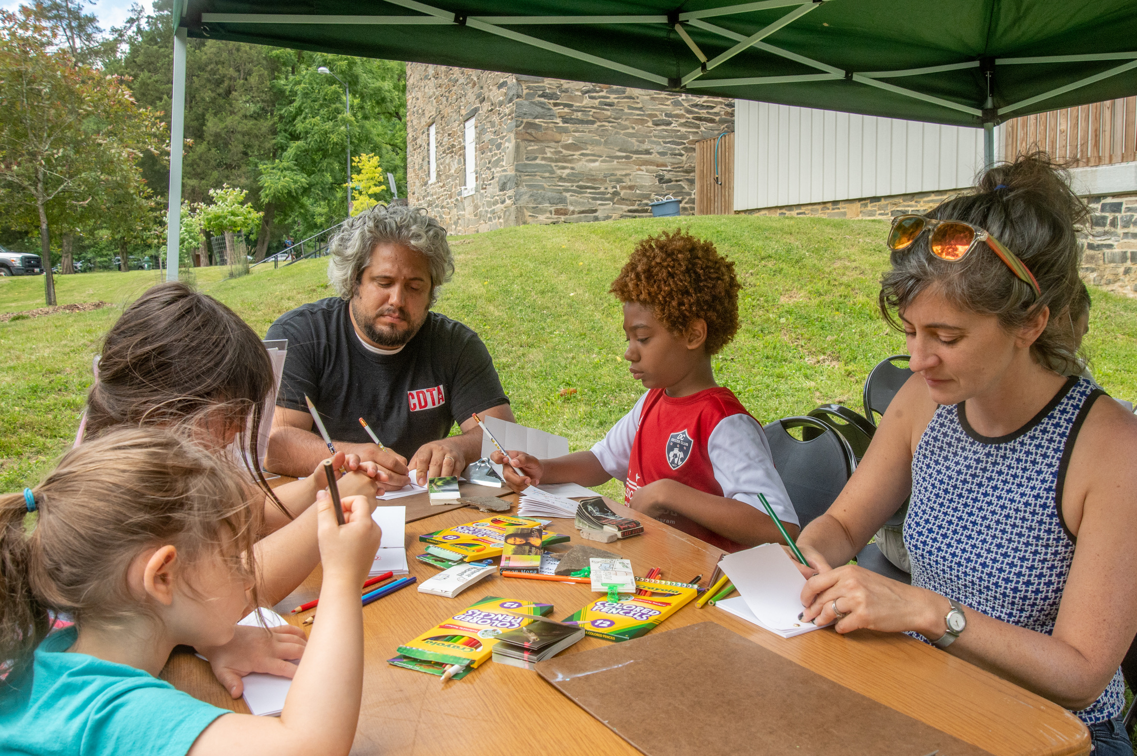 Animators A family works together on drawings projects.