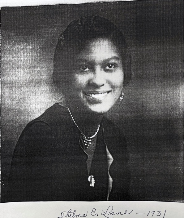 A young woman in 1930s dress